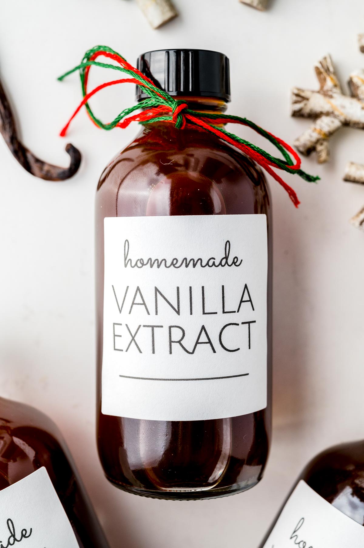 An overhead picture of the finished extract in gifting bottles.