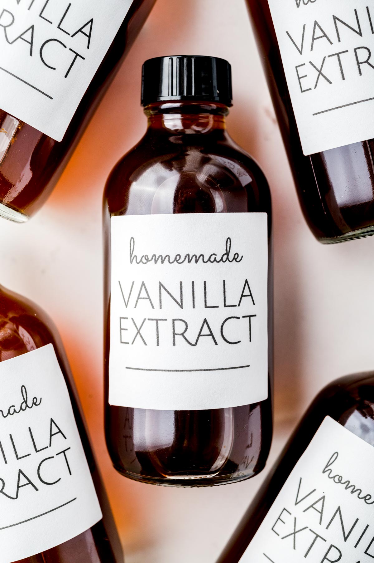 An overhead picture of the finished vanilla extract in gifting bottles.