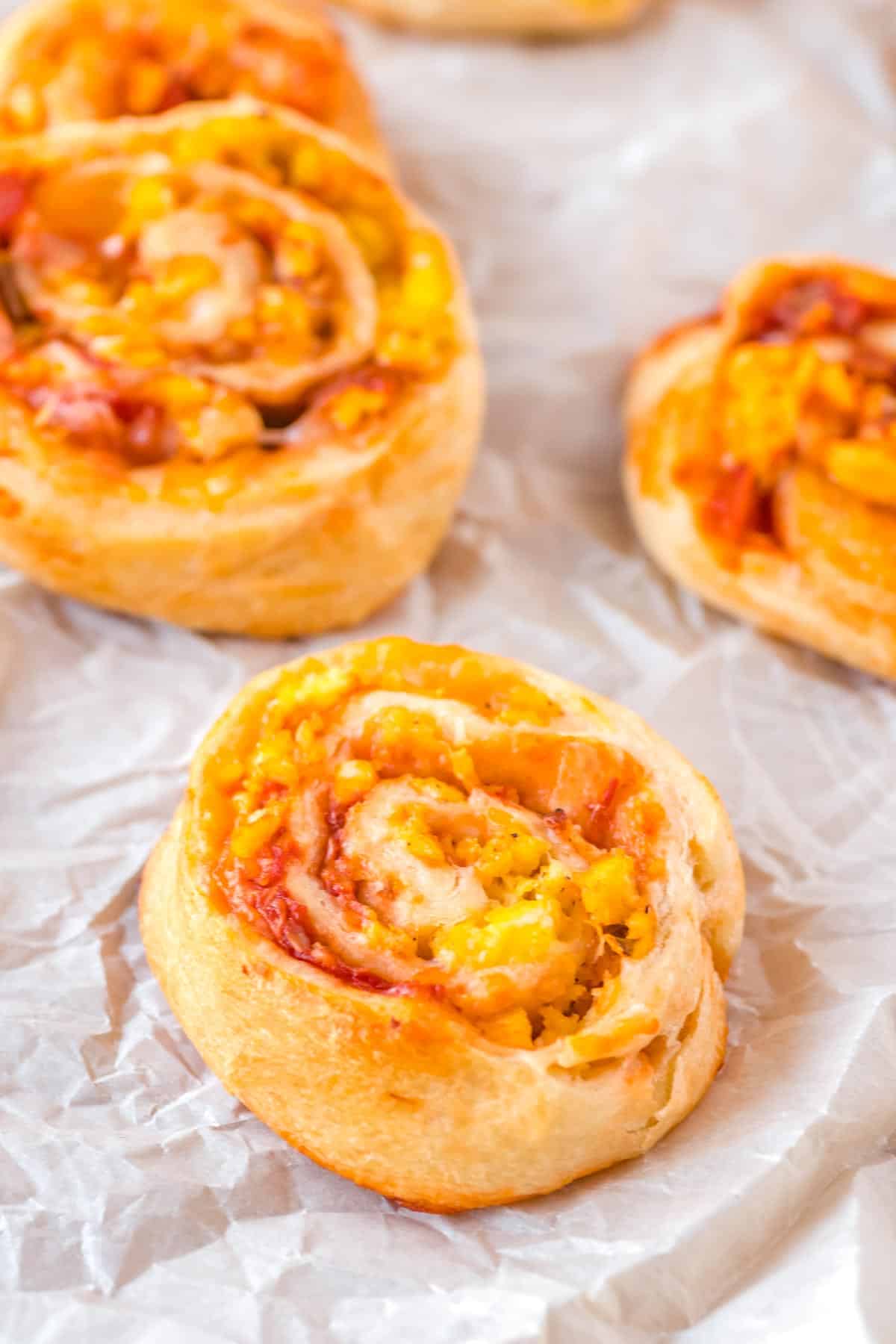 The finished Breakfast Rolls recipe on parchment paper.