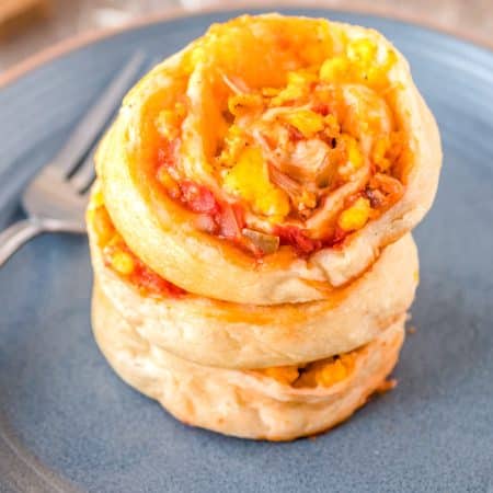 Three of the finished Breakfast Rolls stacked on top of each other.