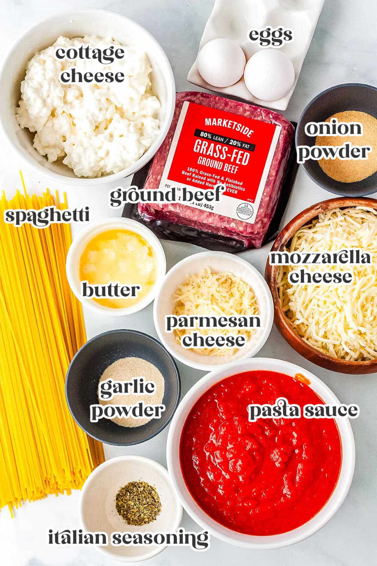 Ingredients for baked spaghetti with text overlay