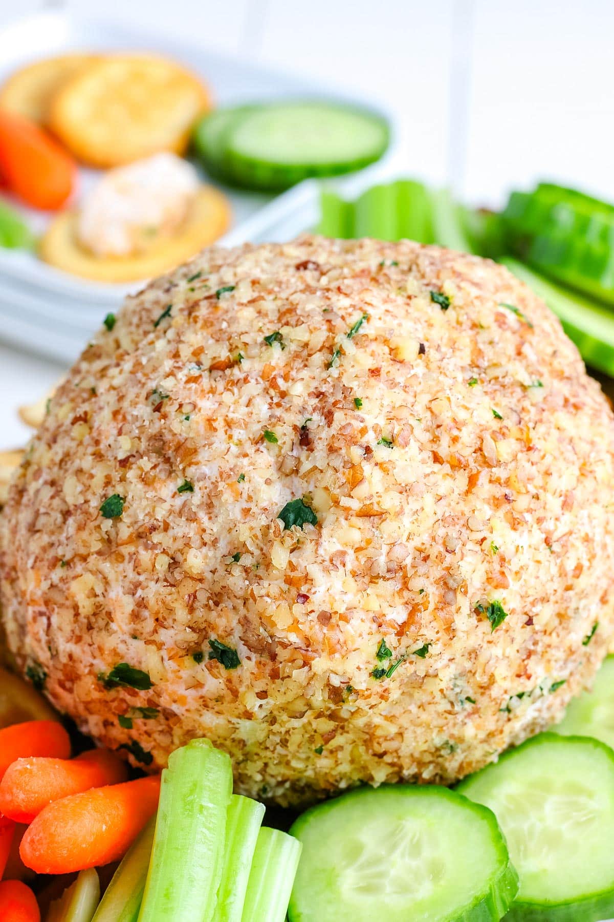 A close up picture of the cream cheese ball before it's cut into. 