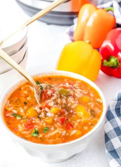 A spoon picking up some of the finished Stuffed Pepper Soup.