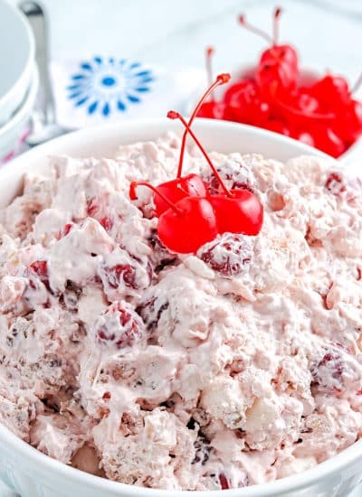A close up picture of the finished Cherry Salad in a serving bowl.