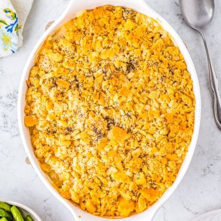 An overhead picture of the finished Chicken Casserole with Poppy Seed in a white casserole dish ready to be served.