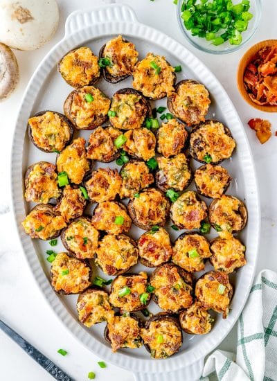 An overhead picture of the finished Bacon Stuffed Mushrooms on a serving platter.