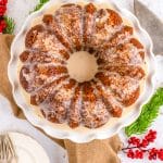 A close up overhead picture of the finished bundt gingerbread cake recipe on a white cake plate.