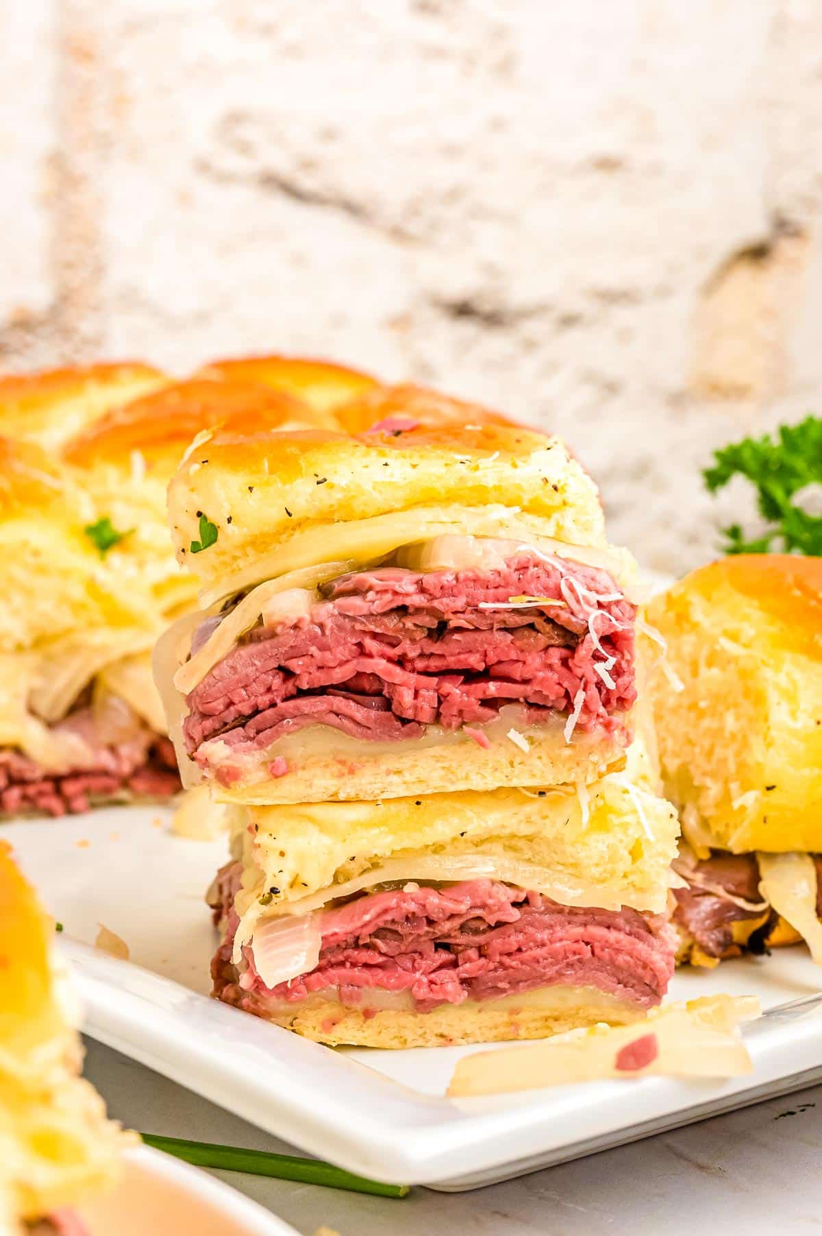 Two of the French Dip Sliders stack on top of each other.