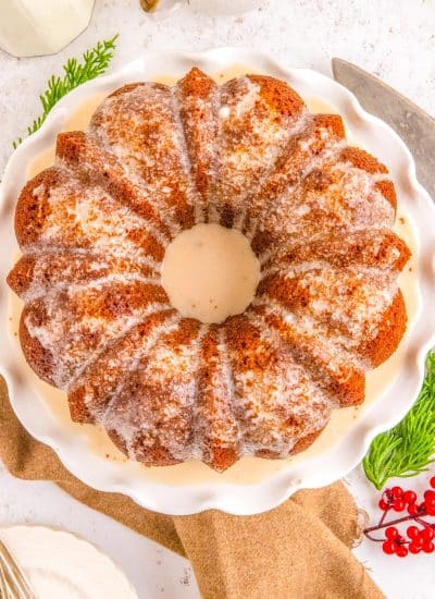 An overhead picture of the finished Gingerbread Bundt Cake on a white cake plate.