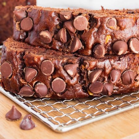 A close up picture of two slices of the chocolate banana bread stacked on top of each other.