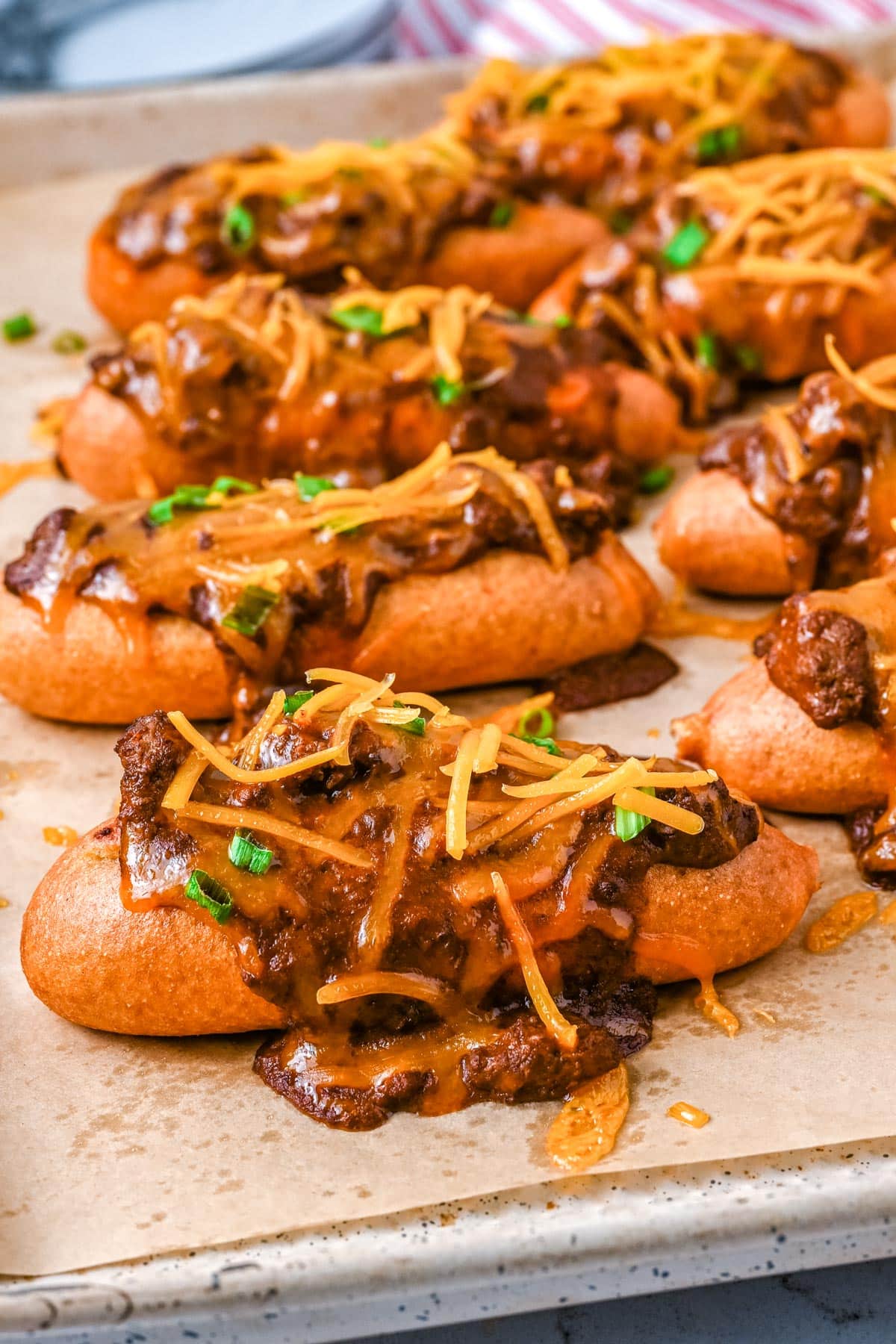 The finished Chili Cheese Corn Dogs on a baking sheet. 