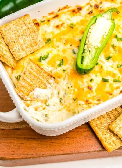 The finished Jalapeno Cheese Dip in a white baking dish.