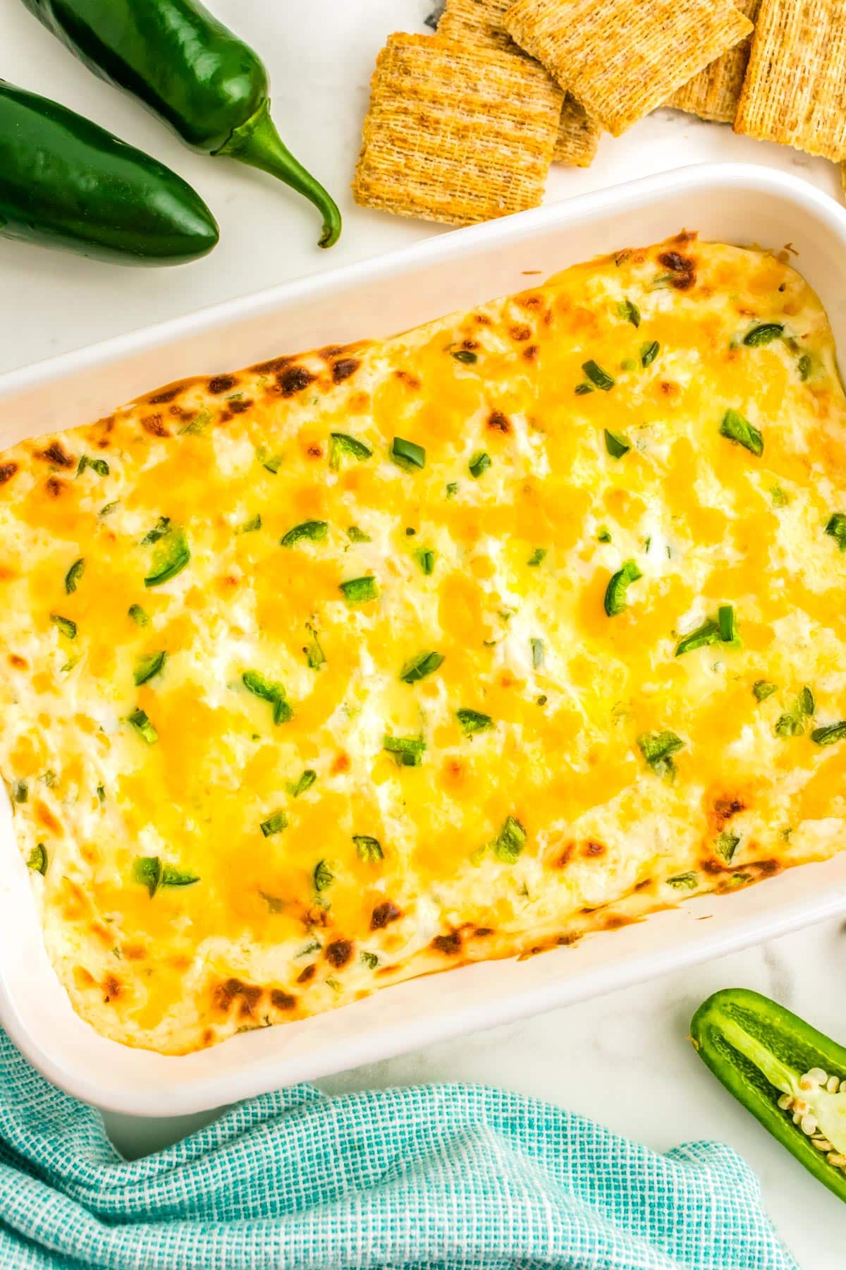 The finished Jalapeno Dip recipe in a white baking dish.