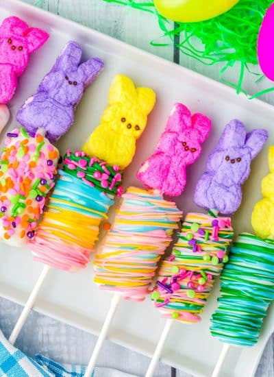 The Easter Marshmallow Pops on a white platter.