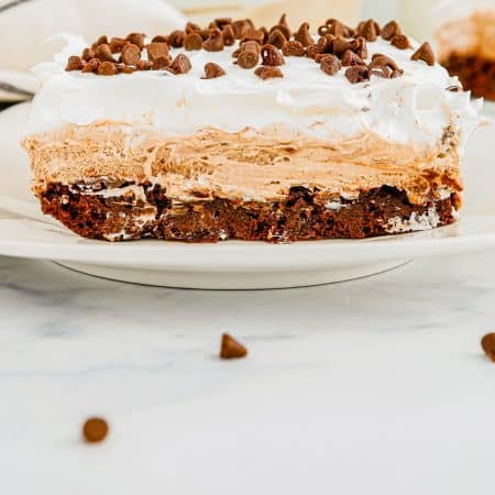 A close up picture of a French Silk Brownie on a plate.