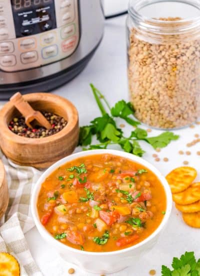 The finished Instant Pot Lentil Soup in a white bowl.