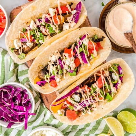 A close up picture of the finished tacos in a taco tray.