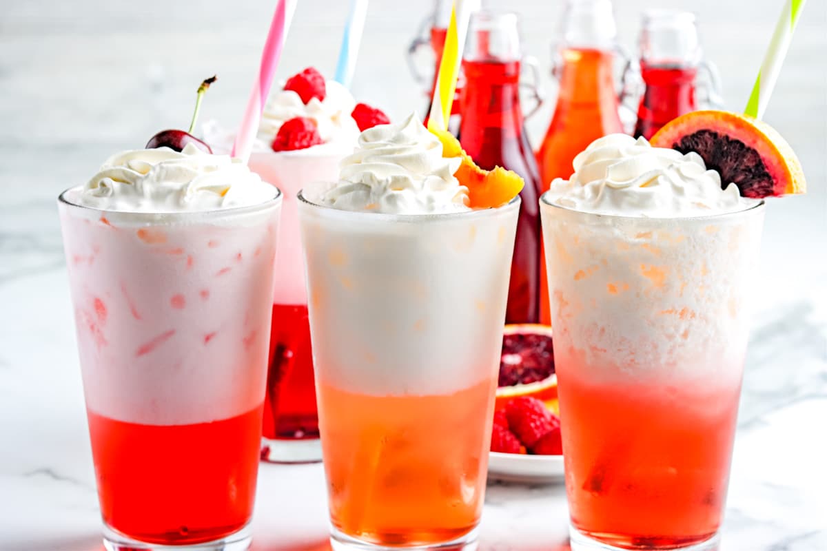 The finished Italian Cream Soda recipe in three glasses.