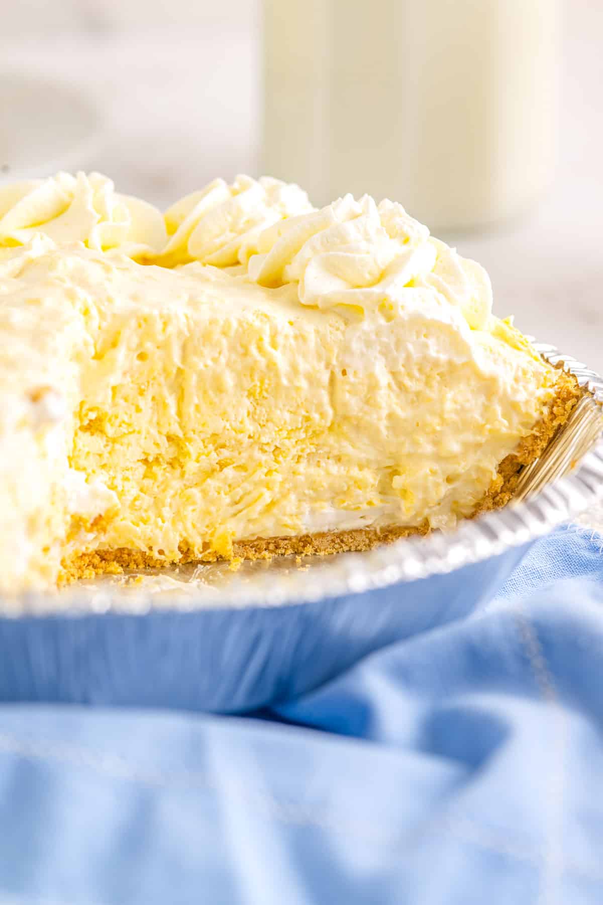 The finished Pineapple Cream Cheese Pie with a slice taken out so you can see what the inside looks like.