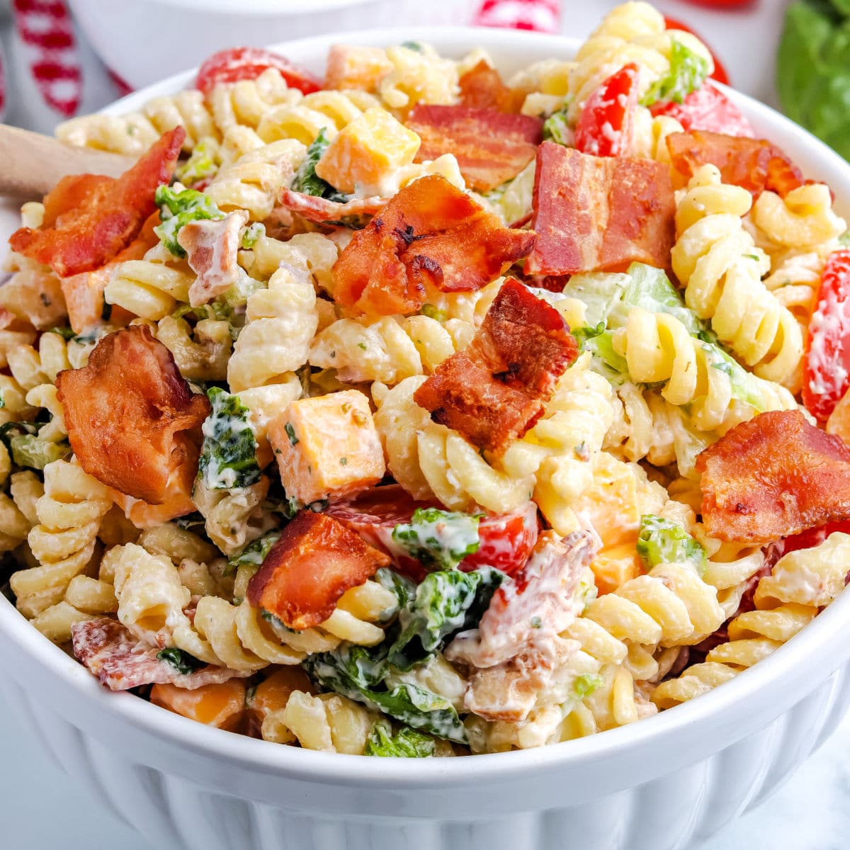 A close u p of a bowl full of this BLT Pasta Salad recipe.