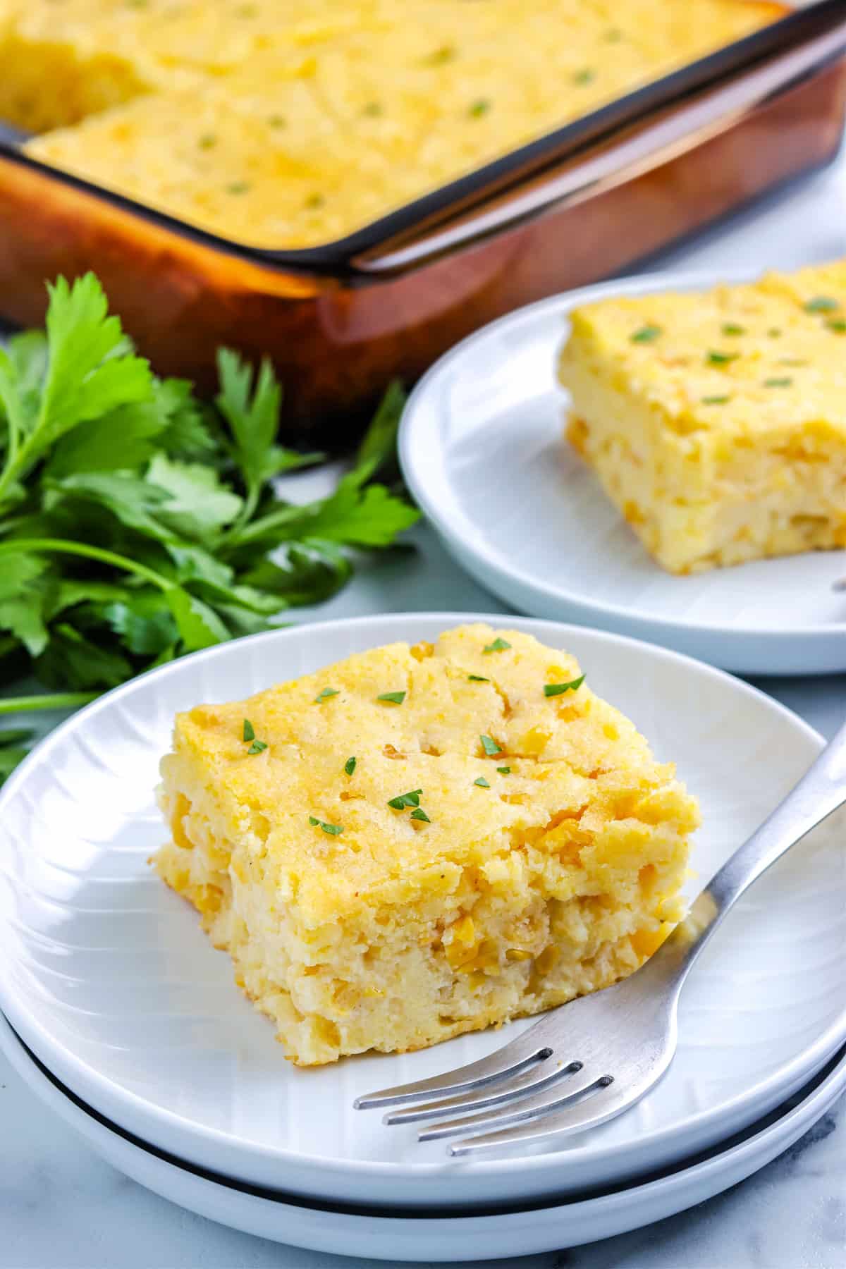 Some Jiffy Corn Casserole served on a white plate.