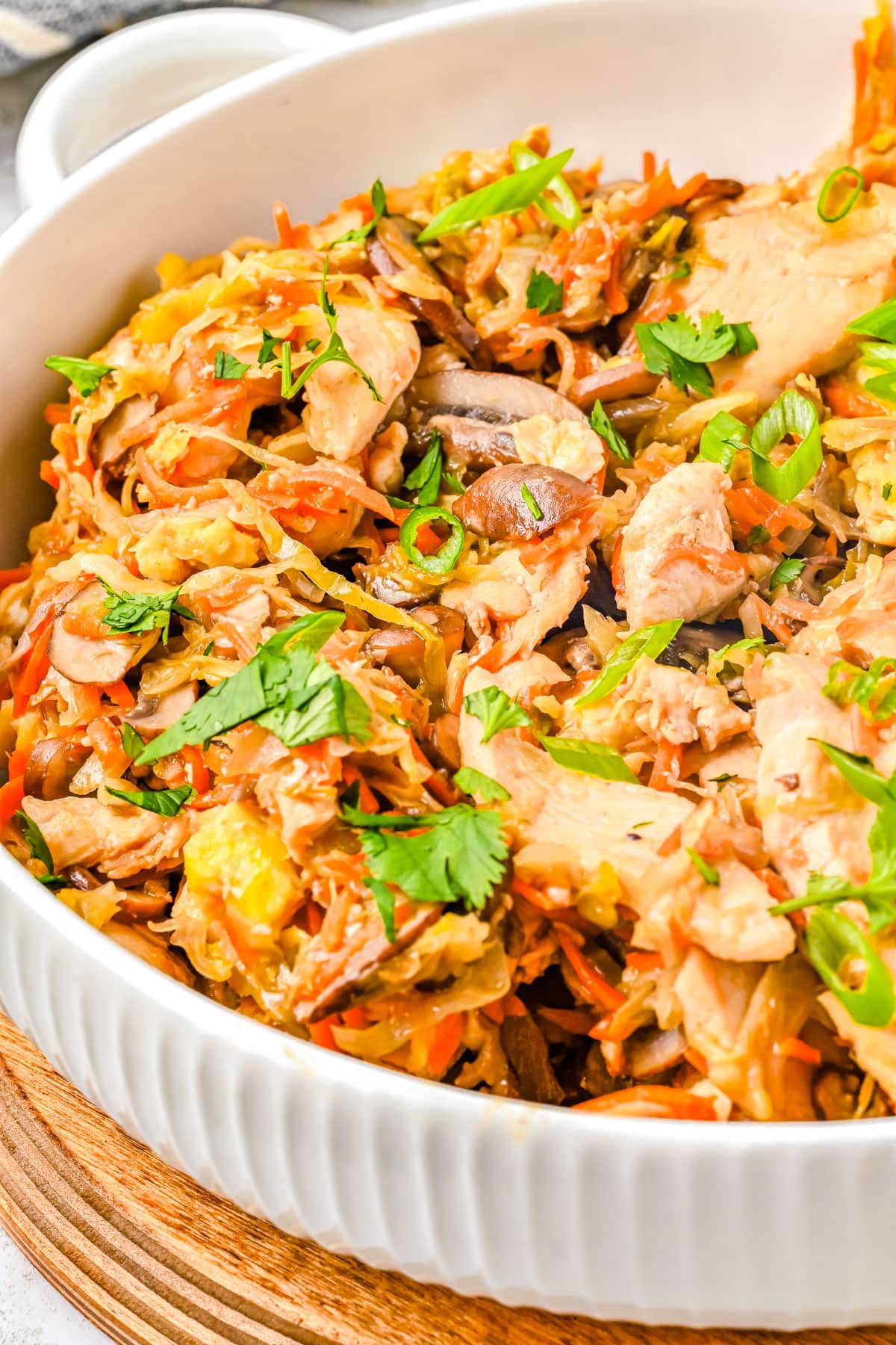 A close up picture of the finished Moo Shu Chicken in a serving bowl.