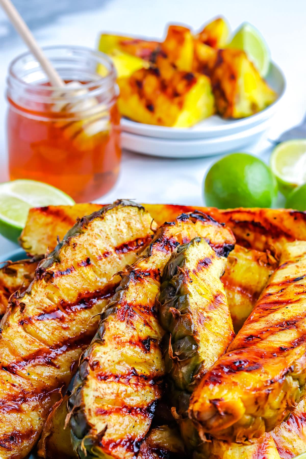 A close up picture of grill pineapple on a platter.