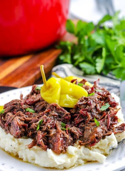 Smoked Mississippi Pot Roast served over mashed potatoes.