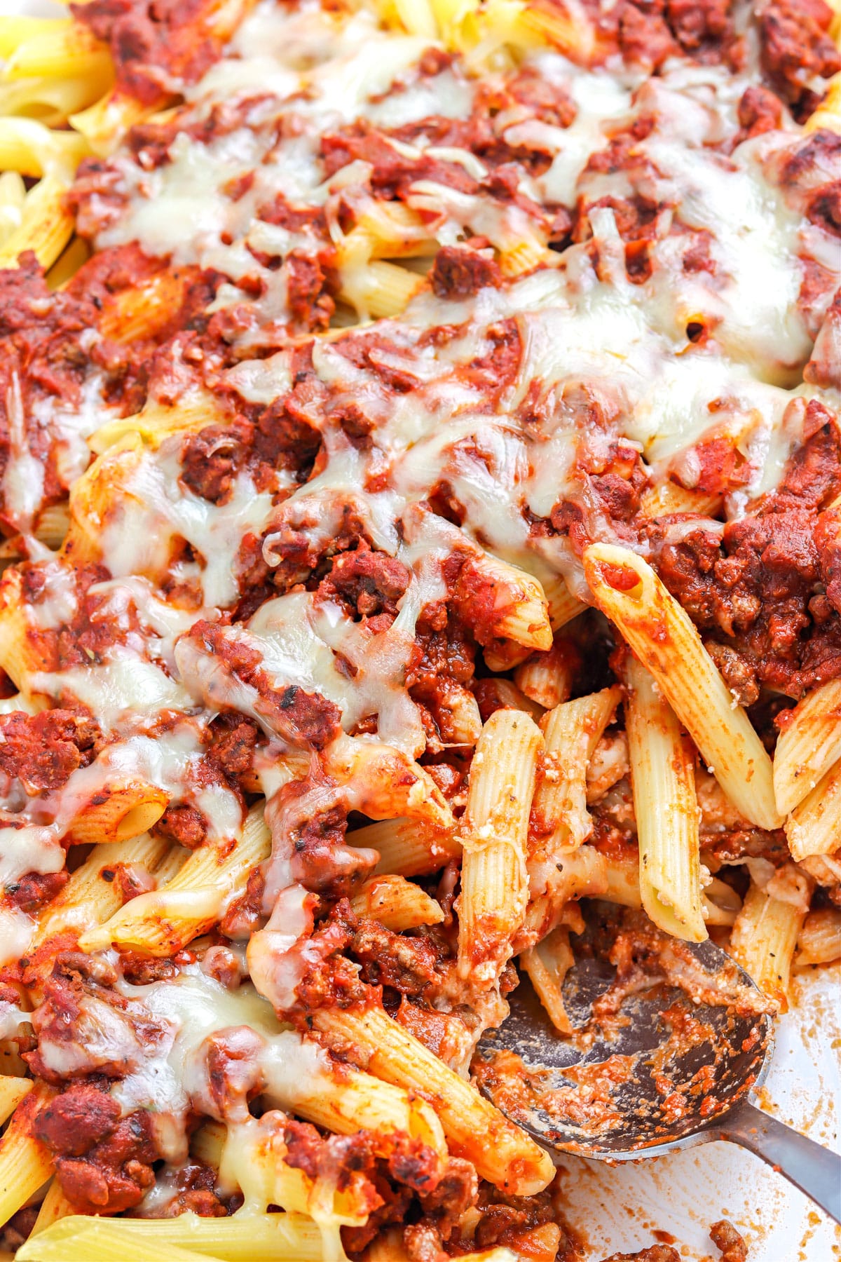 A spoon in the finished Baked Penne ready to be served. 