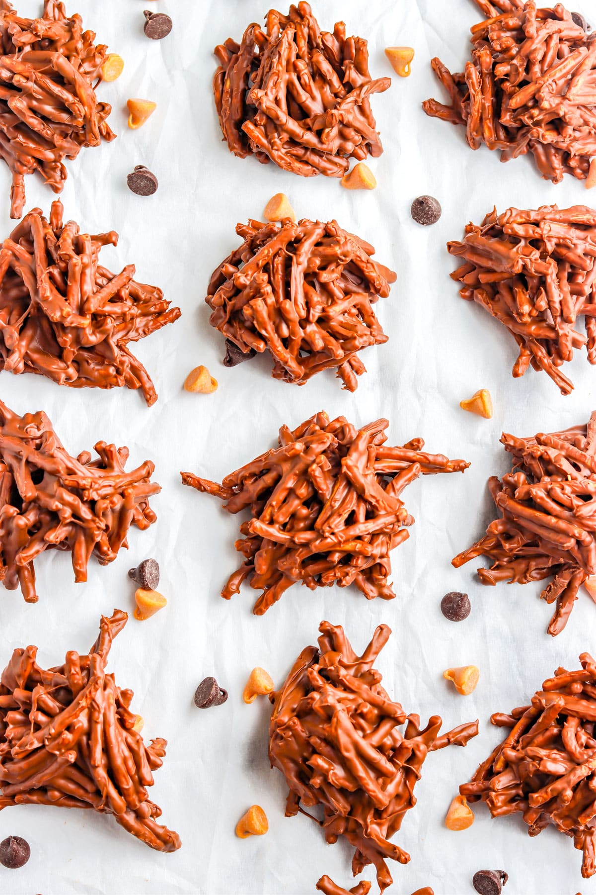 A close up of the finished Haystack Cookies on parchment paper. 