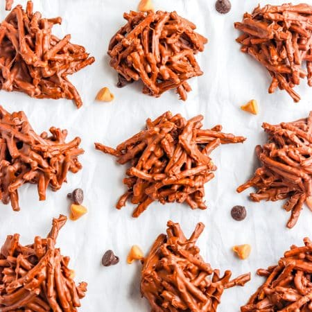 An overhead picture of the finished Haystacks Cookies on parchment paper.