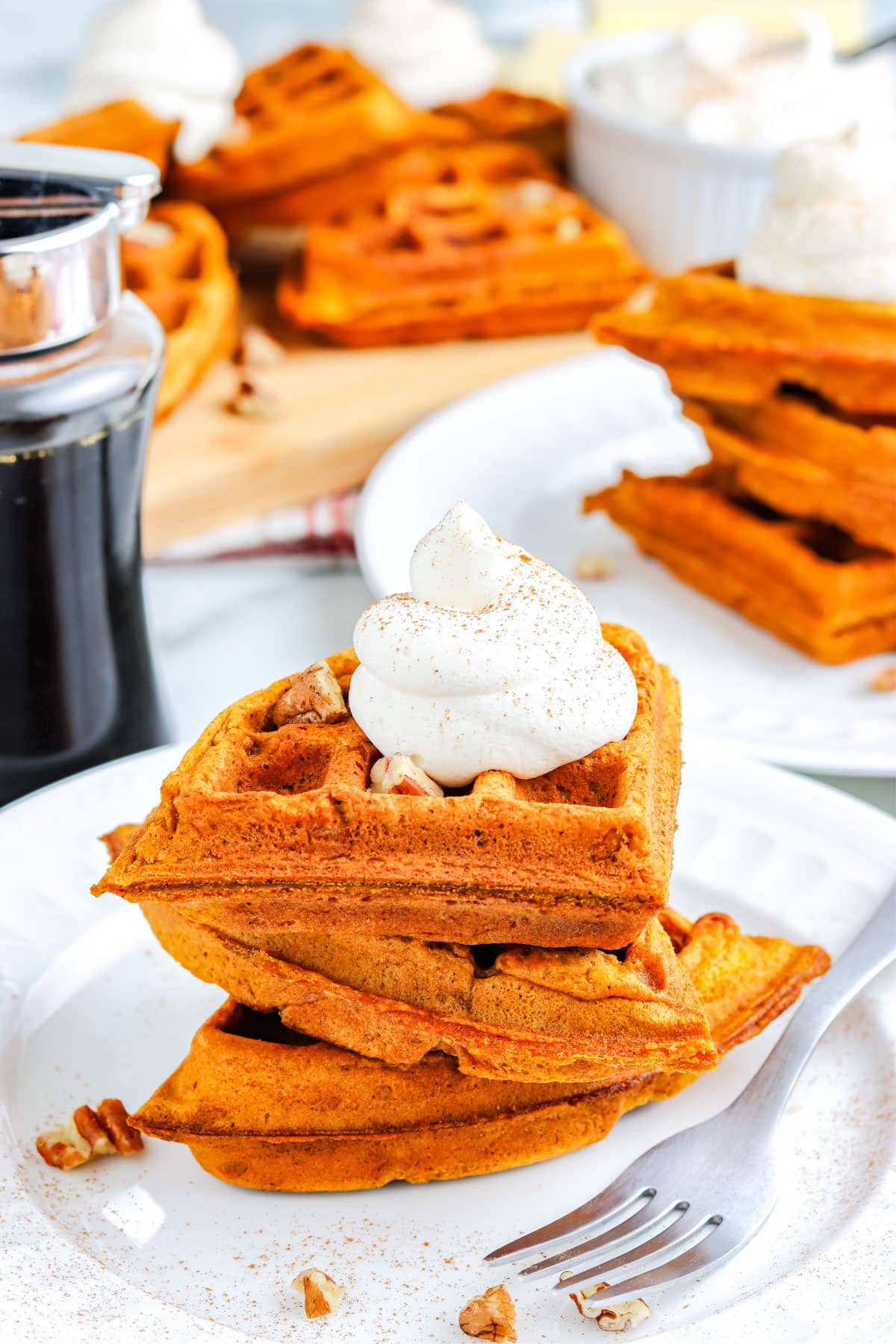 Three Pumpkin Waffles stacked on each other.
