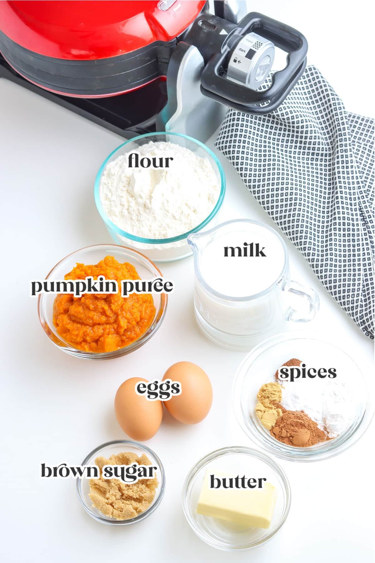 ingredients for making pumpkin waffles with text overlay