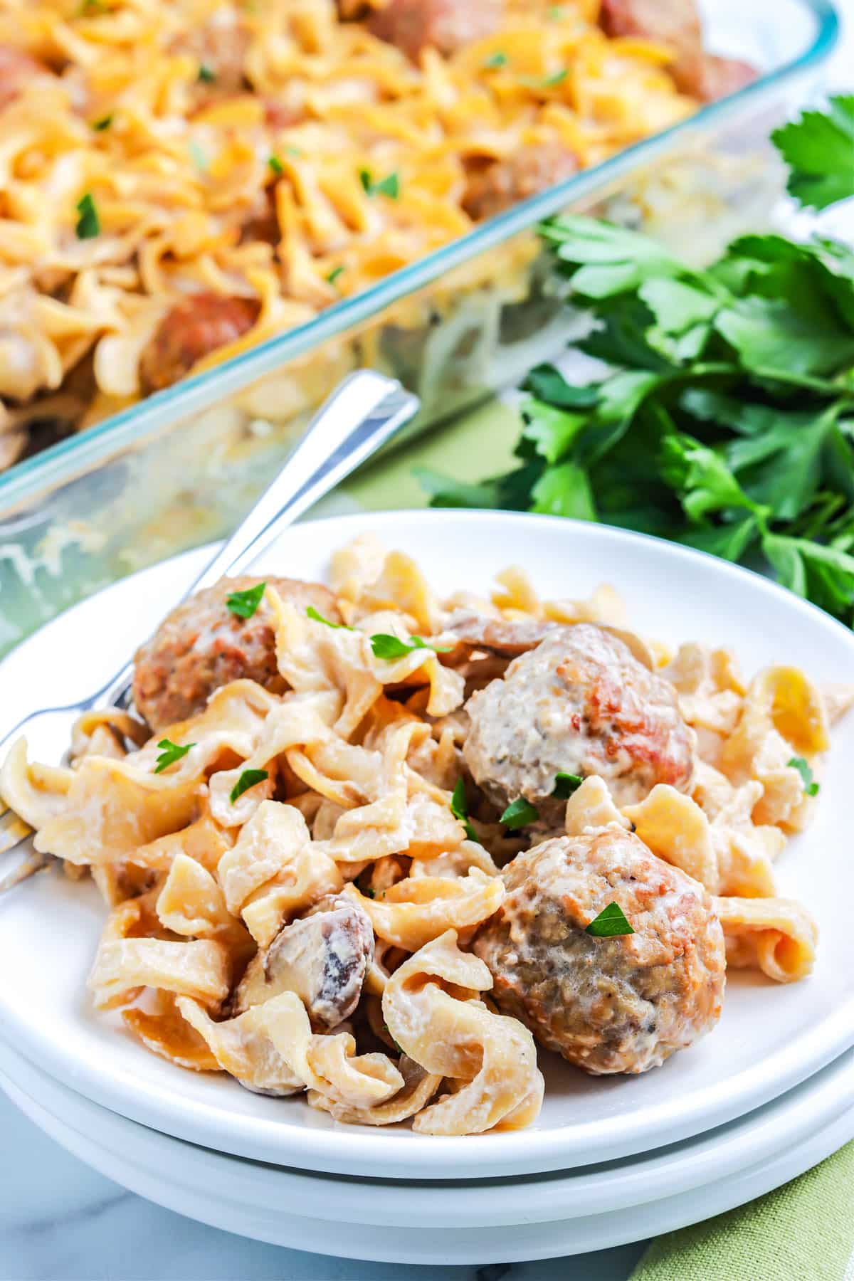Some of the Swedish Meatball Casserole recipe scooped out onto a plate.
