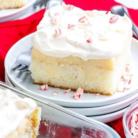 Peppermint Poke Cake on a white plate.