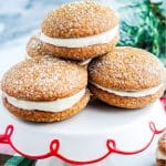 Four Gingerbread Whoopie Pies on a cake stand.