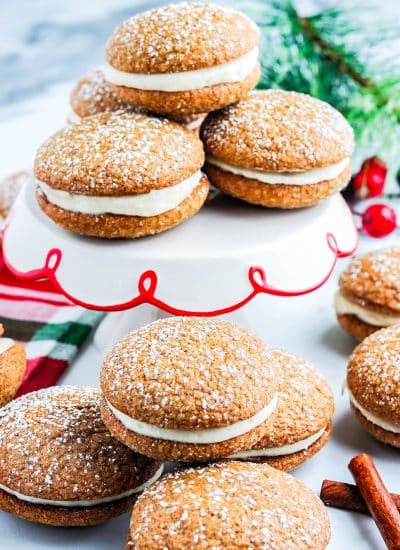 The finished Gingerbread Whoopie Pies on a cake stand.