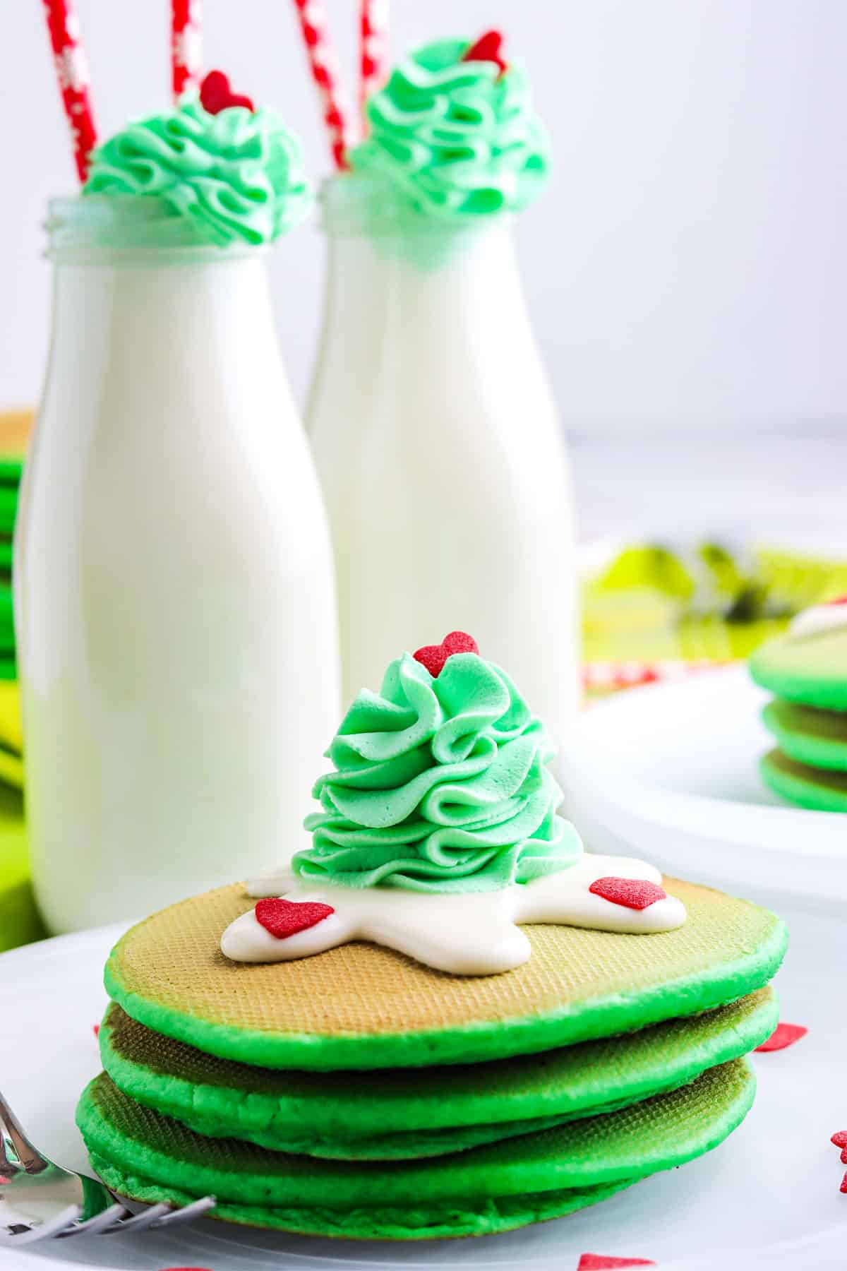 A close up of a stack of The Grinch Pancakes.