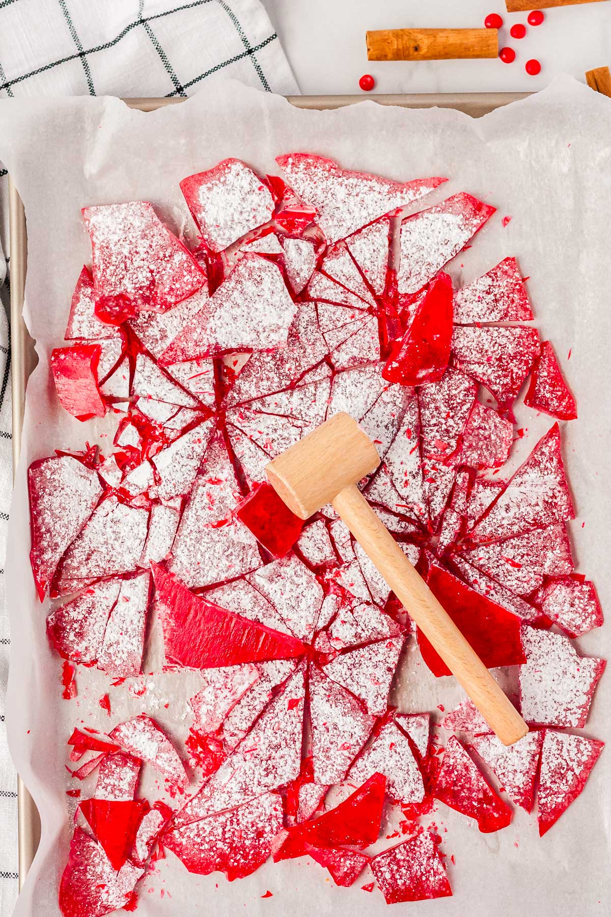 An overhead of the finished Cinnamon Candy recipe right after it was smashed with a wooden mallet. 