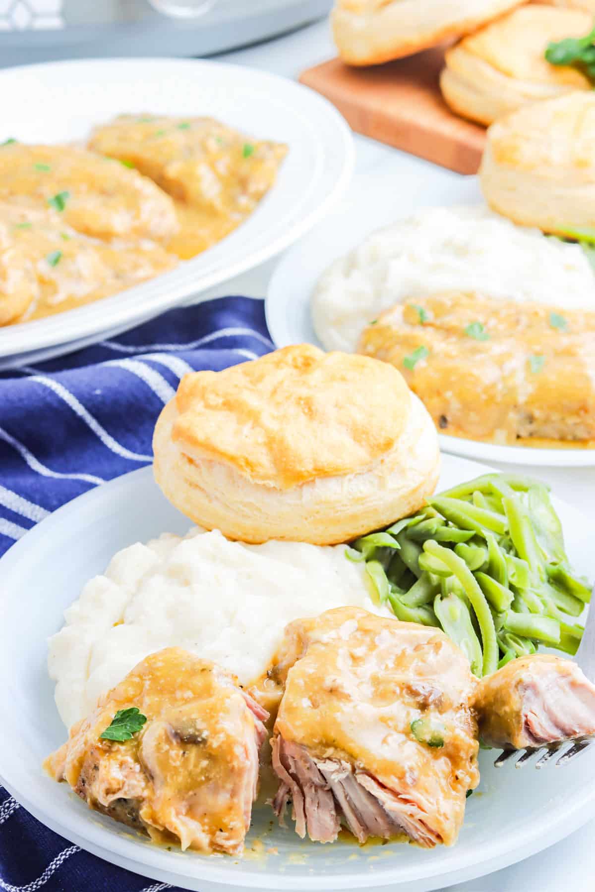 A ranch pork chop cut into so you can see how juicy it is.