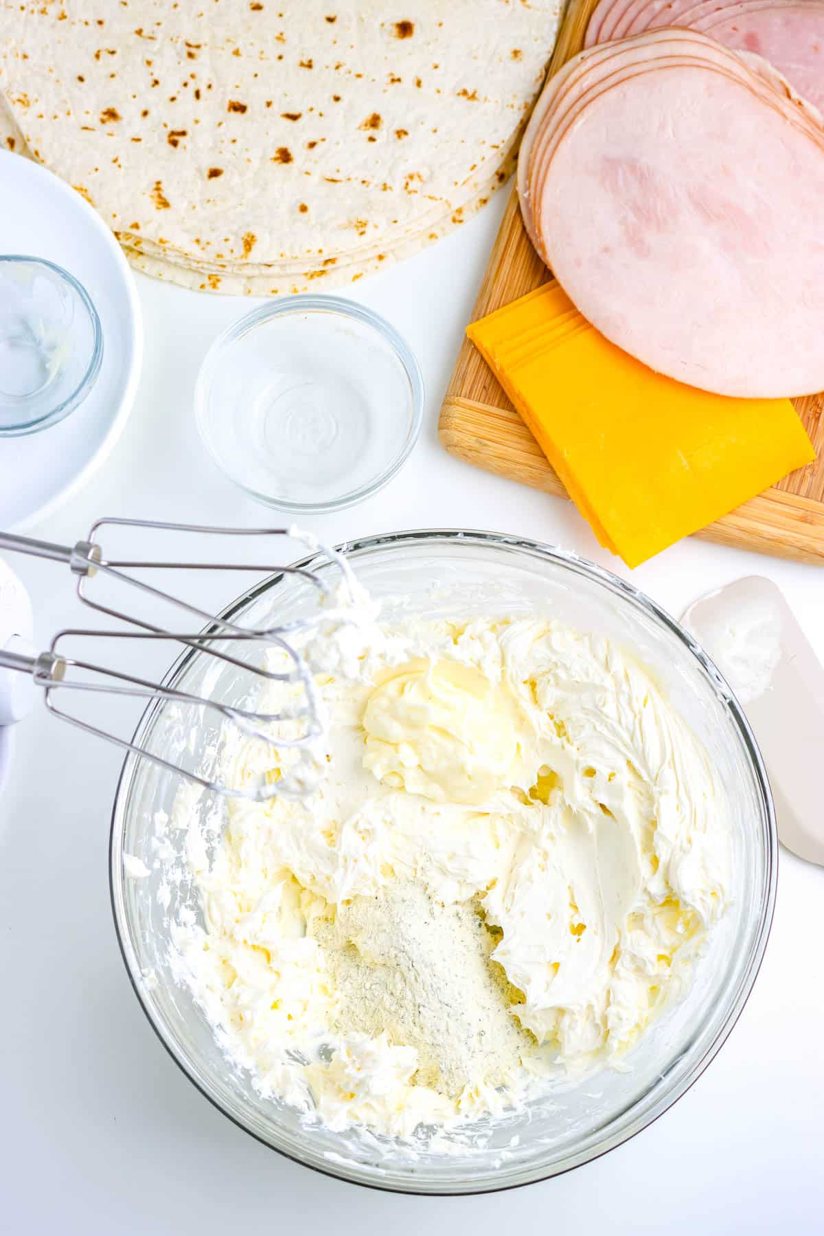 Softened cream cheese in a bowl.