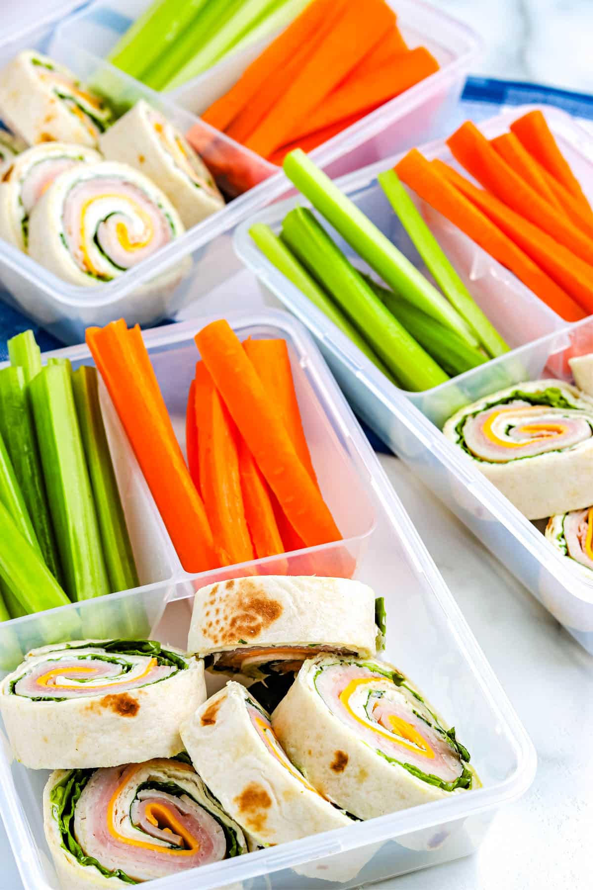 Pinwheel Sandwiches in a container for lunches.