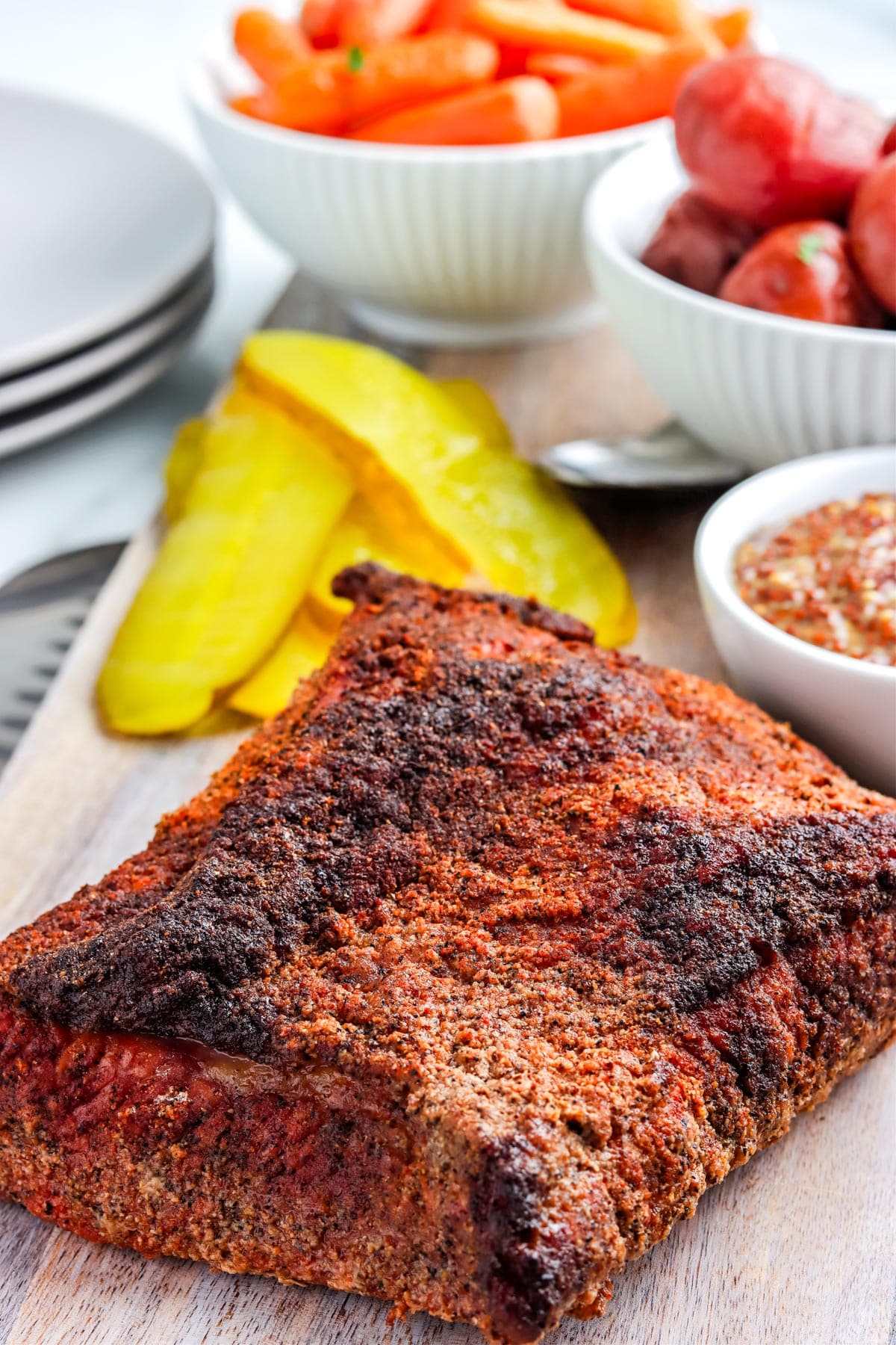 The finished Smoked Corn Beef on a cutting board before it is sliced.