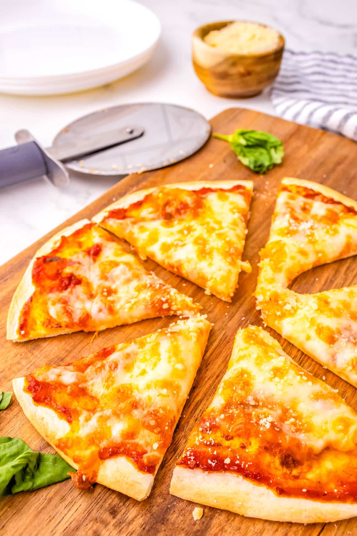 A close up of slices of an air fryer pizza tortilla.