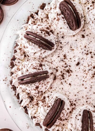 A close up picture of half of the finished Oreo Pie in a pie dish.
