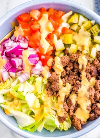 The assembled burger bowls in a white serving bowls.
