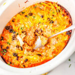 a crockpot of chicken enchilada casserole