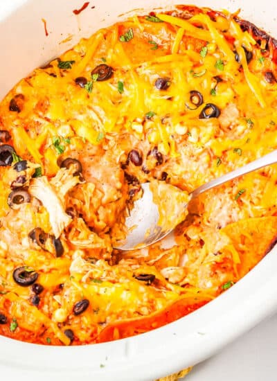 a crockpot of chicken enchilada casserole