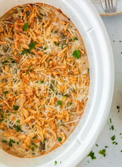 a crockpot with green bean casserole in it