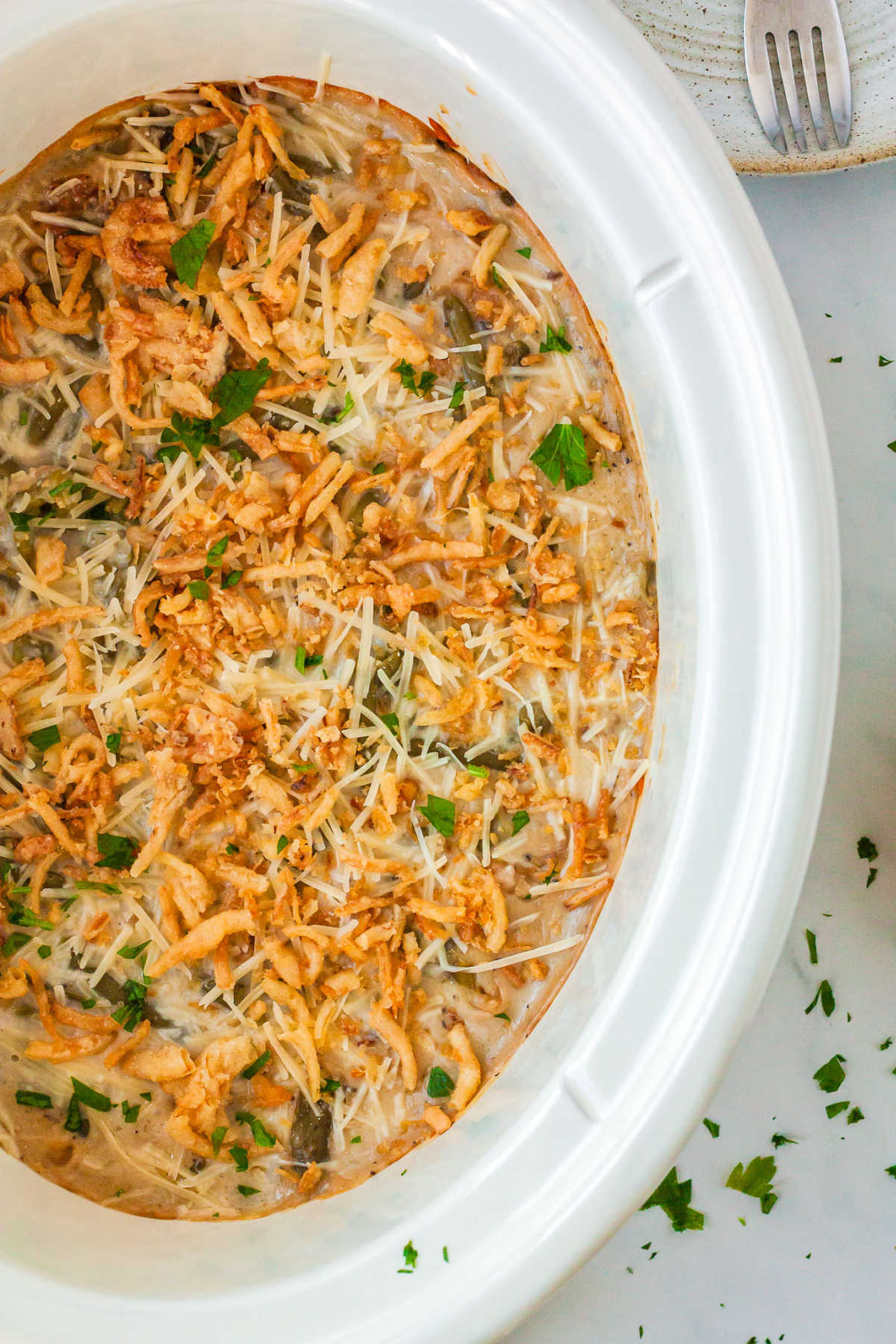a crockpot with green bean casserole in it